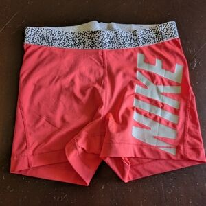 Nike Women's Athletic Shorts in Pink and White
